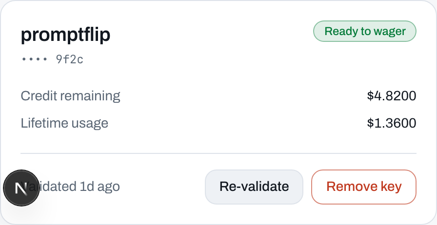 PromptFlip's saved key card, showing a Ready to wager badge, the key's last four characters, its remaining limit and lifetime usage, and Re-validate and Remove key buttons.